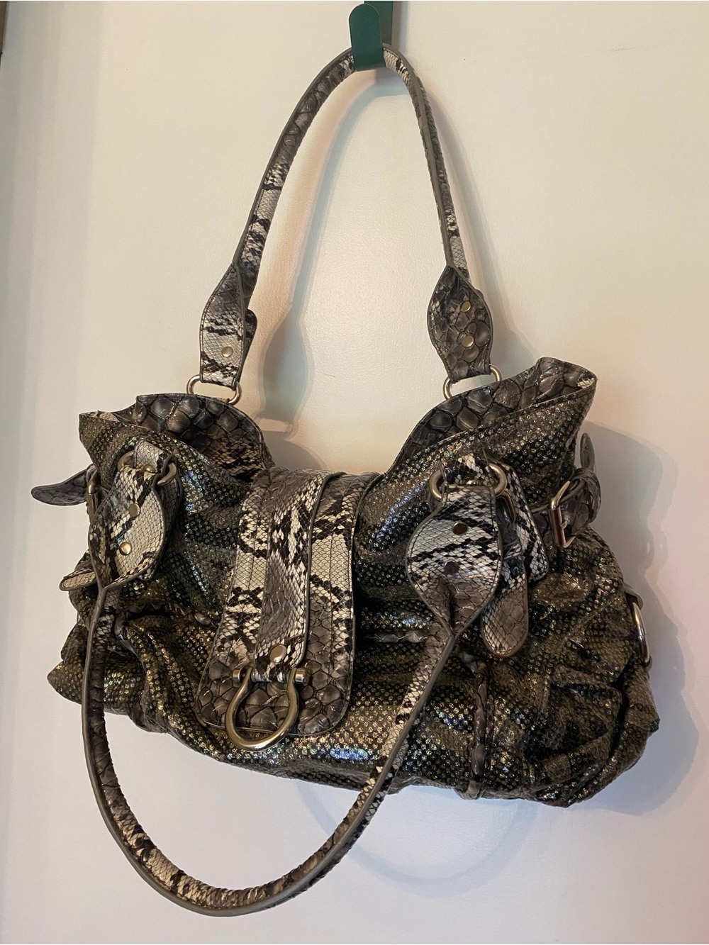 Faux snake skin slouch bag with metallic shimmer buckles galore